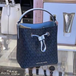 Michael Kors mini bucket bag in signature leather